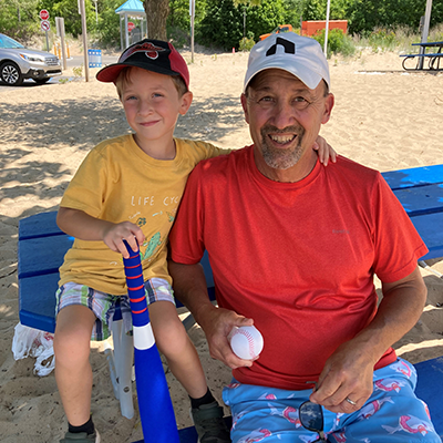Tom Campbell with grandchild